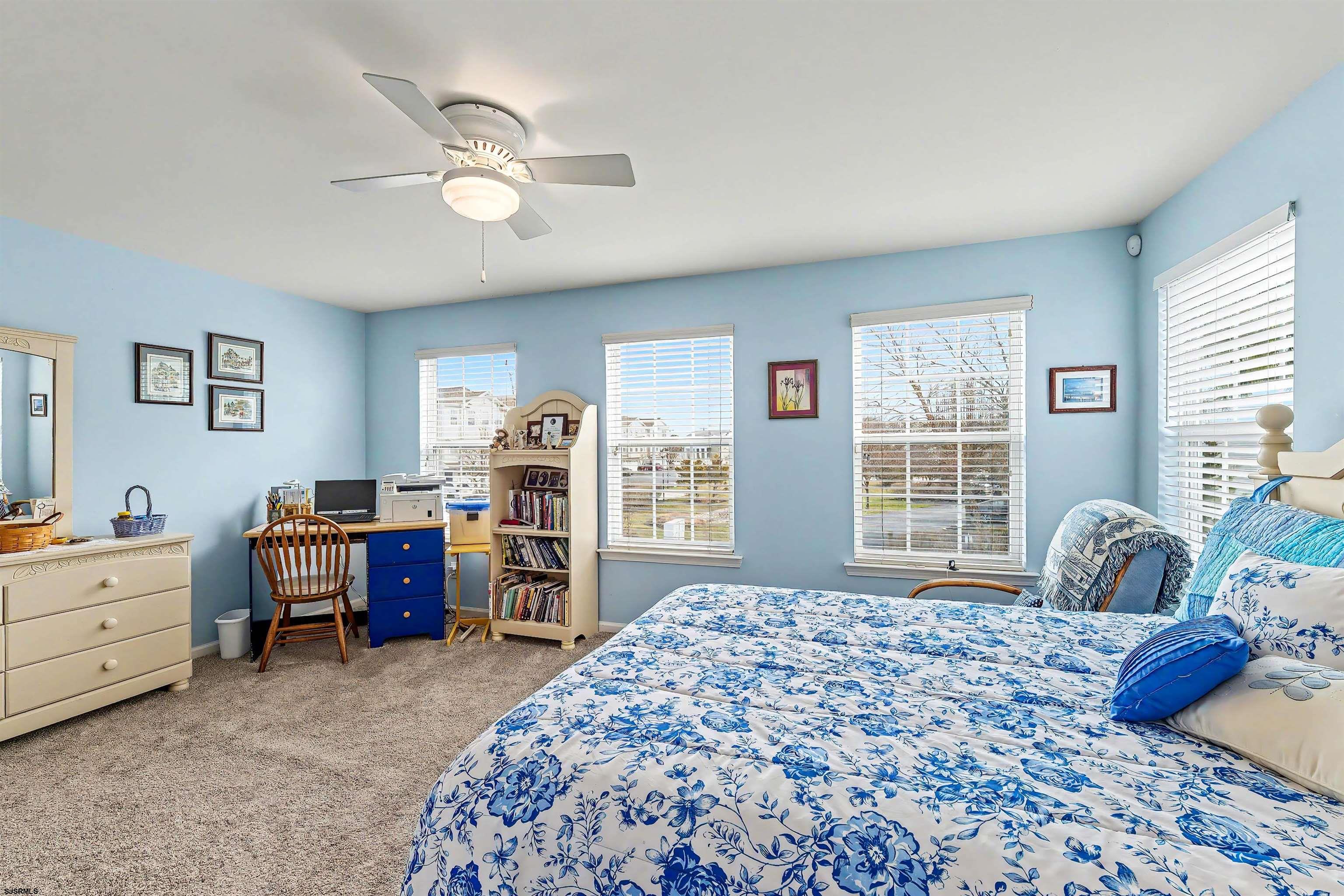 35 Bayside Drive, Unit 35 Somers Point, NJ 08244 - Photo 21 of 40 a bed room with a bed and a window