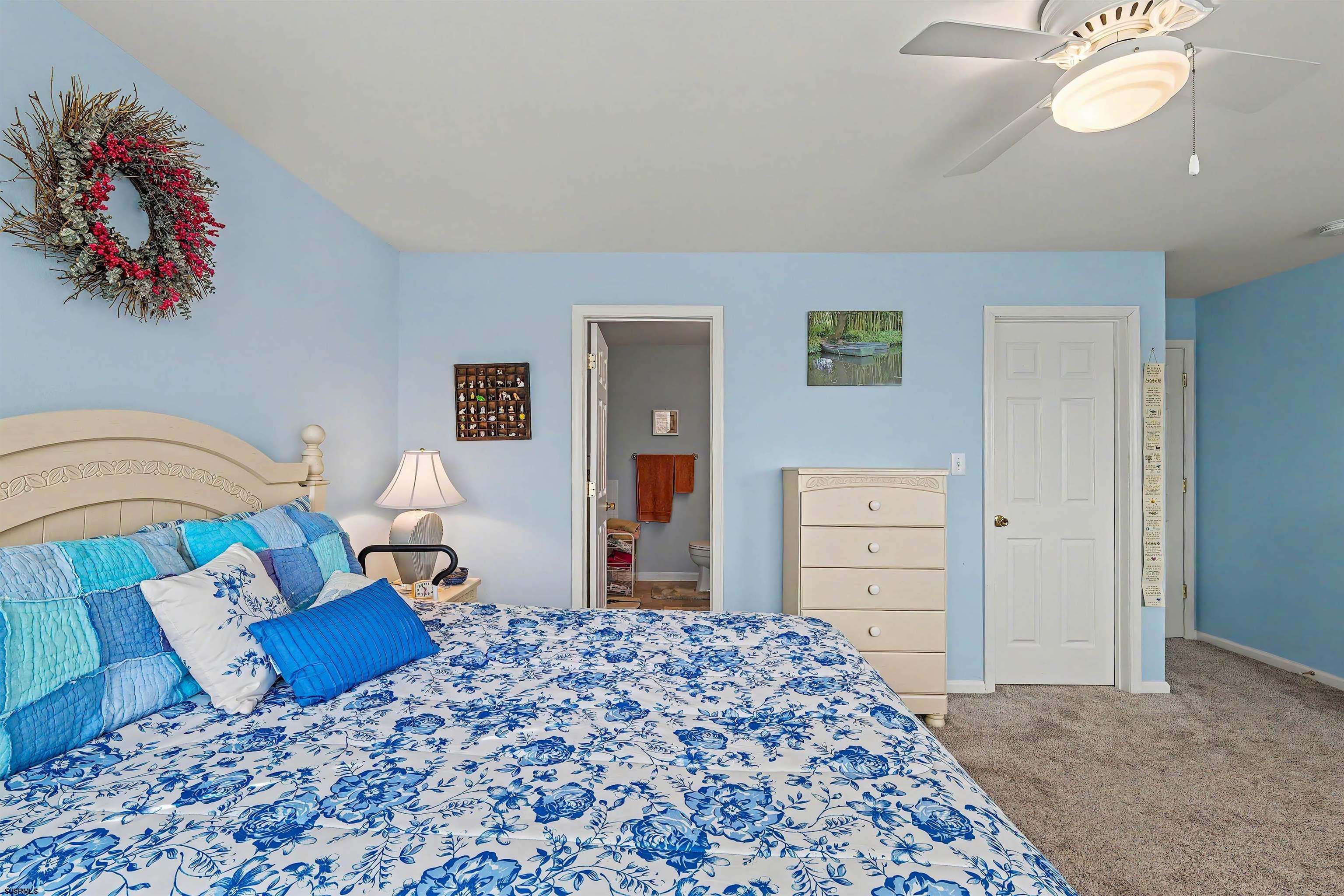 35 Bayside Drive, Unit 35 Somers Point, NJ 08244 - Photo 22 of 40 a bedroom with a bed dresser and a window