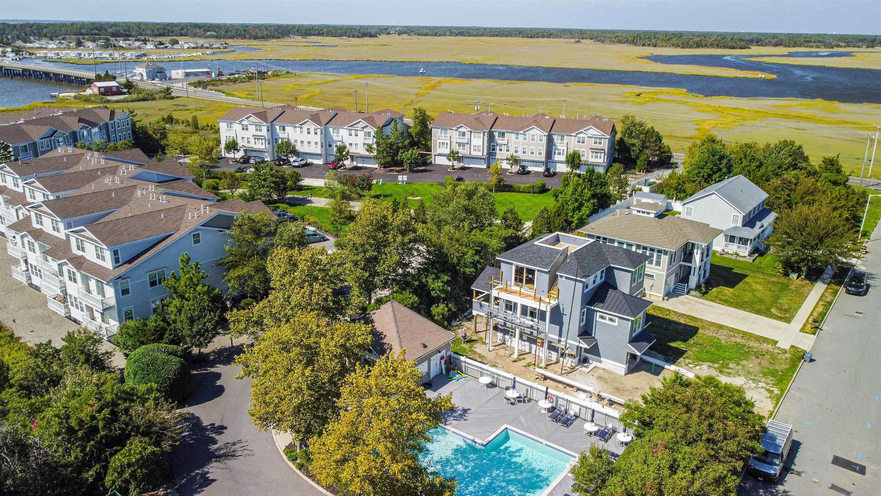 35 Bayside Drive, Unit 35 Somers Point, NJ 08244 - Photo 26 of 40 an aerial view of residential building with outdoor space and ocean view