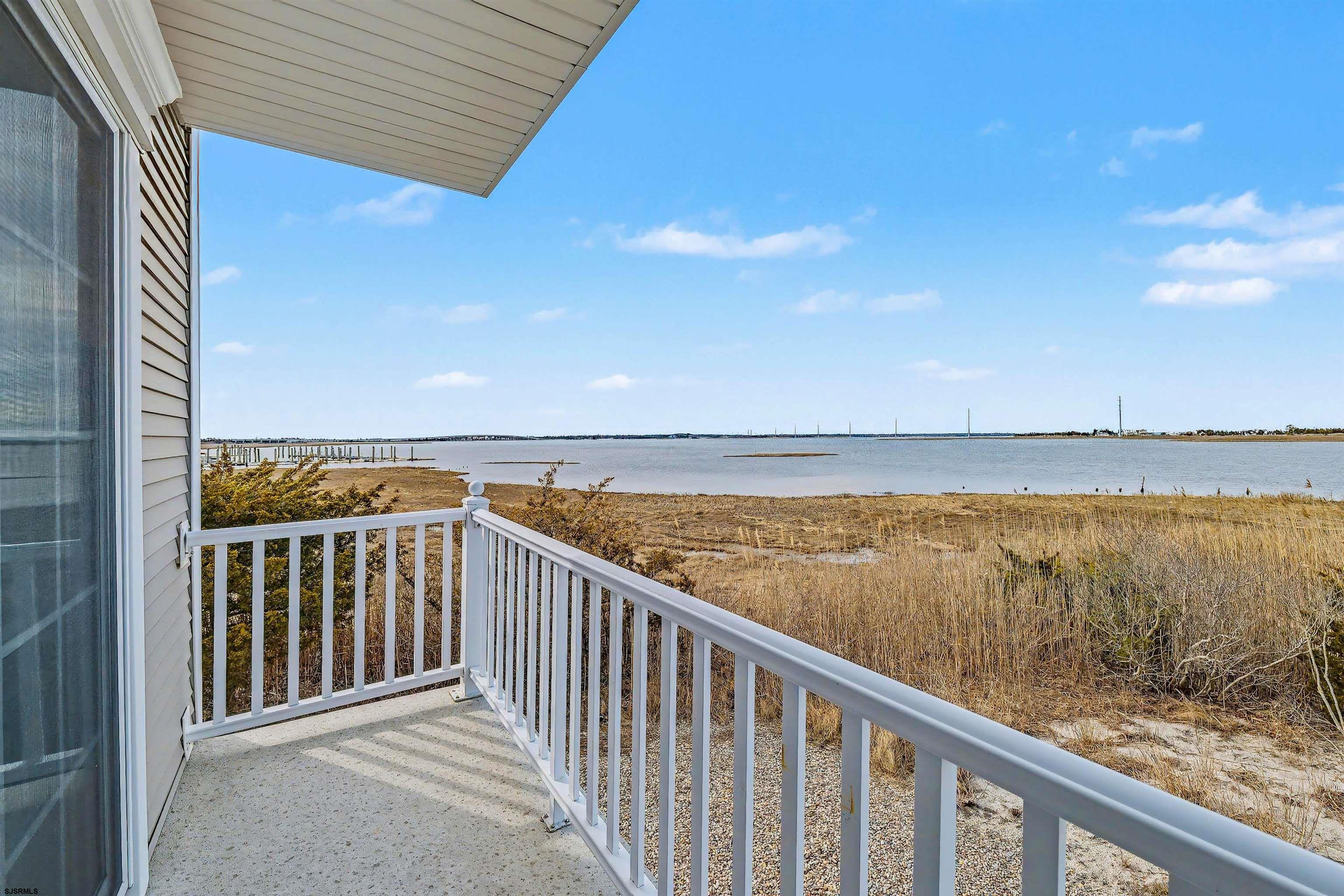 35 Bayside Drive, Unit 35 Somers Point, NJ 08244 - Photo 4 of 40 a view of ocean from a balcony