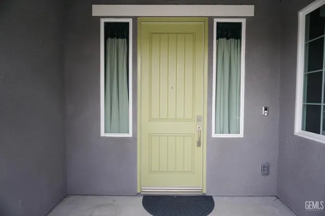 a view of entryway with wooden floor