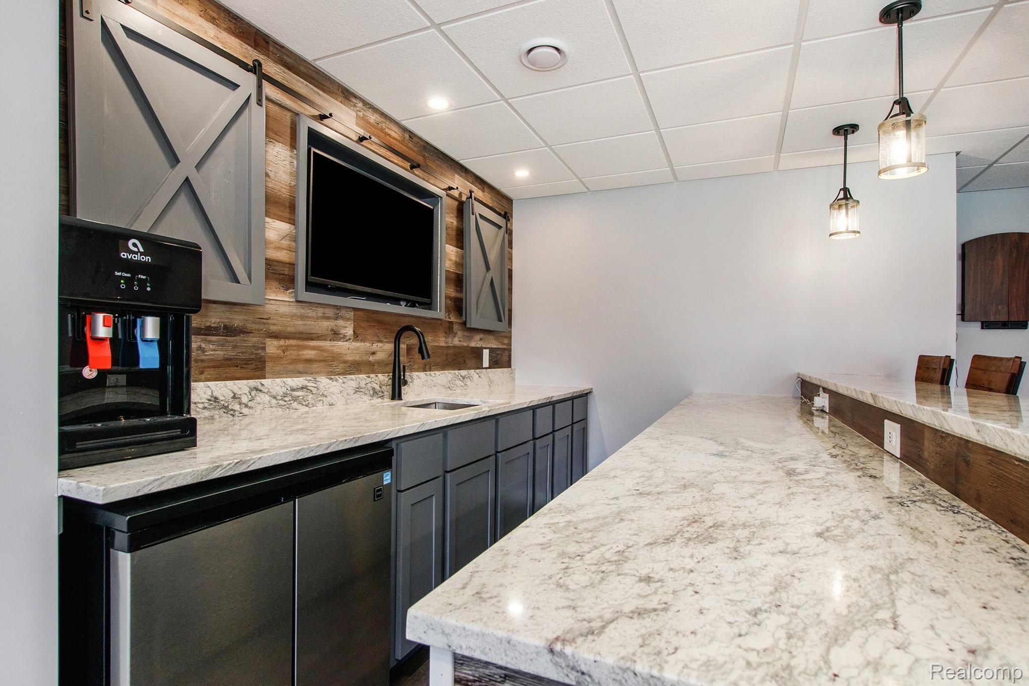 1174 Kile Road Metamora, MI 48455 - Photo 22 of 40 Custom wet bar in basement