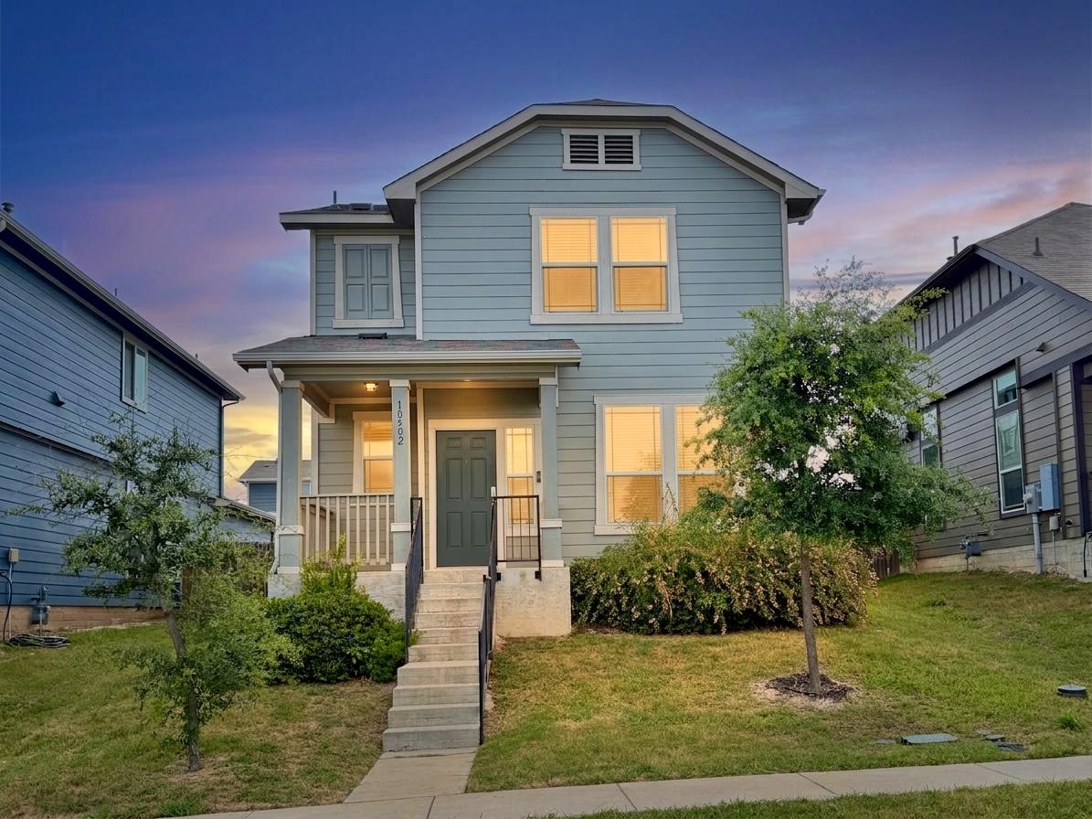 10502 Fulton Avenue Austin, TX 78754 - Photo 1 of 36 A charming residence with a welcoming front porch and well-maintained lawn awaits.