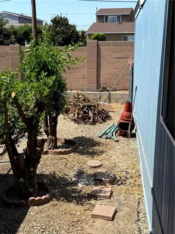 a view of a backyard of the house