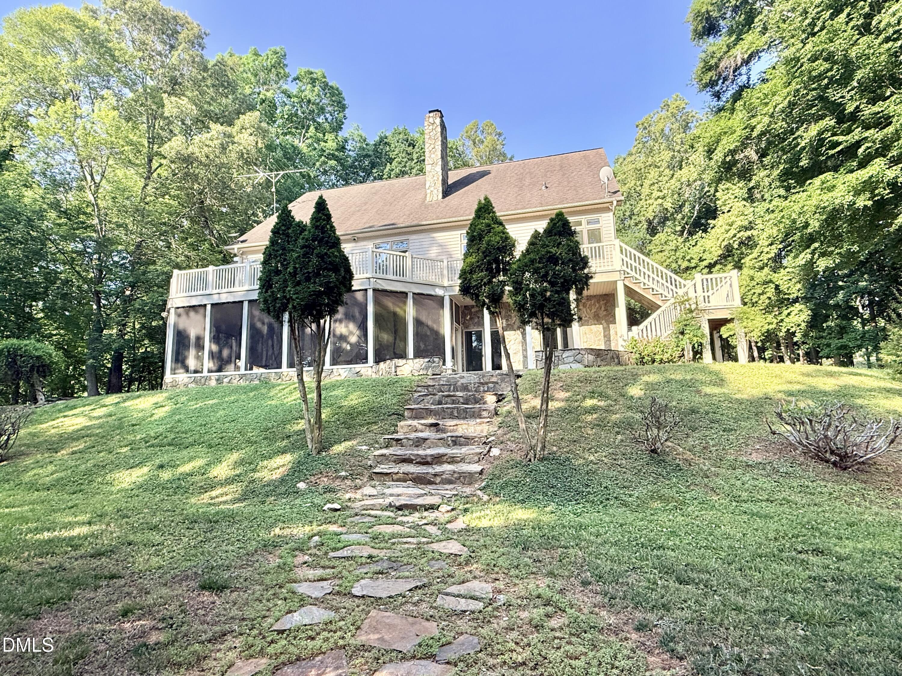 81 Beaver Crossing Road Roxboro, NC 27574 - Photo 56 of 80 a view of a house with a yard