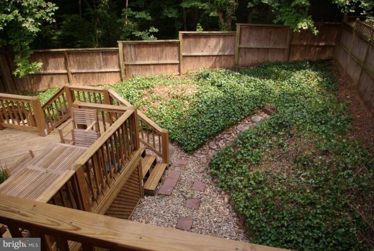 3503 Russell Road Alexandria, VA 22305 - Photo 2 of 16 a view of house along with deck and trees