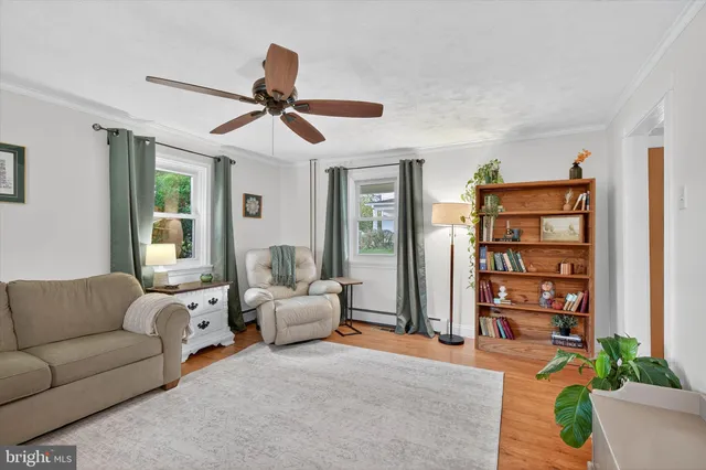 a view of a house with wooden deck