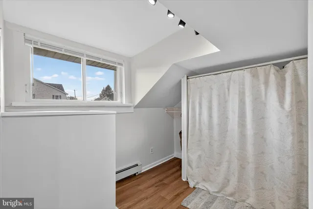 a view of a park with a slide