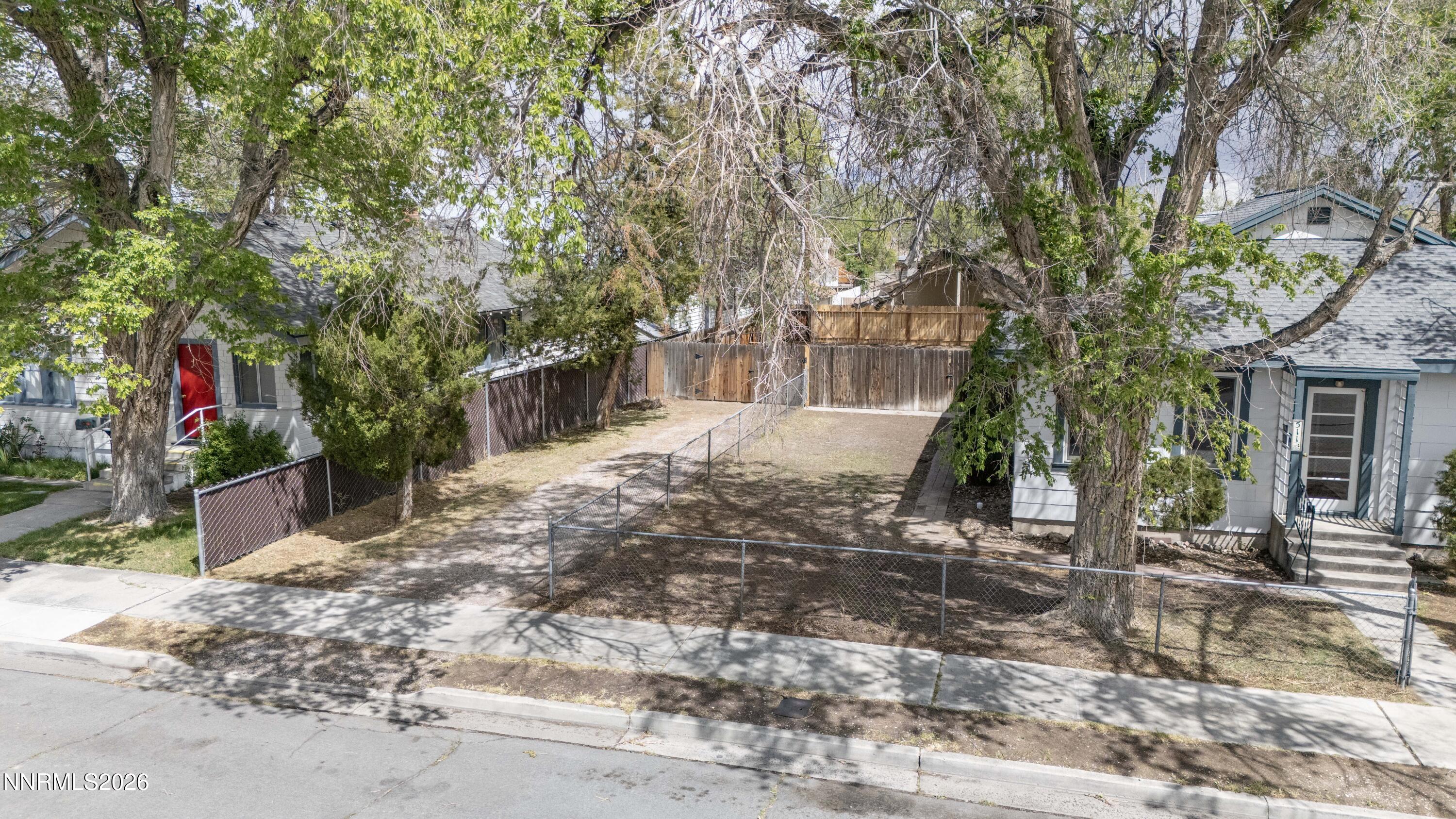 511 Churchill Street Fallon, NV 89406 - Photo 37 of 37 a front view of a house with a yard and tree s