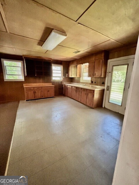 585 Huddleston Road Fayetteville, GA 30214 - Photo 3 of 11 a view of a livingroom with furniture and windows