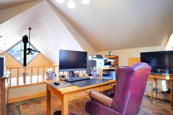 a kitchen with stainless steel appliances granite countertop a sink and cabinets