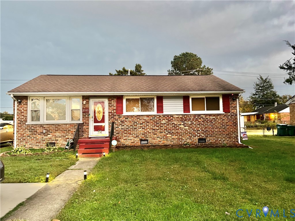 2305 Apollo Road Richmond, VA 23223 - Photo 1 of 16 View of front of home with a front yard, crawl spa