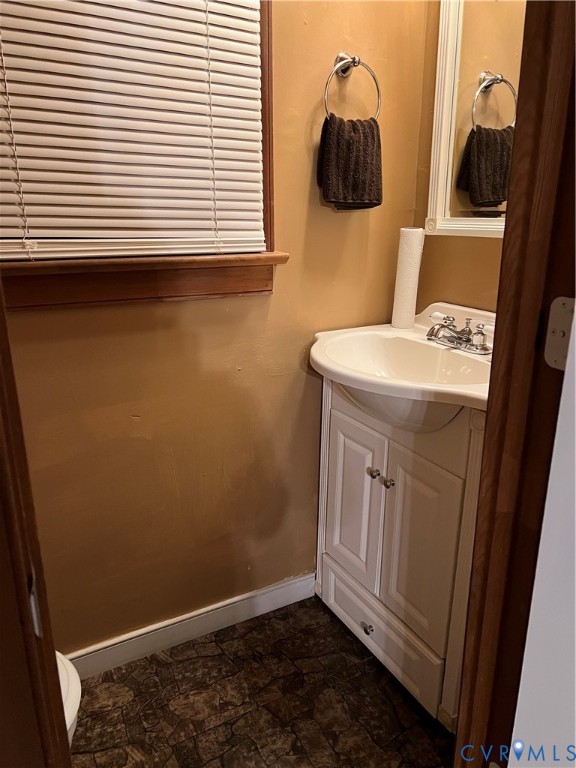 2305 Apollo Road Richmond, VA 23223 - Photo 10 of 16 Half bathroom with vanity