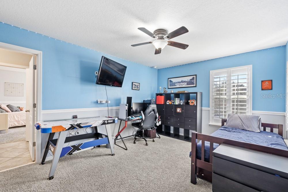 706 Fringe Tree Court Deland, FL 32724 - Photo 38 of 70 a view of a workspace with furniture and a window