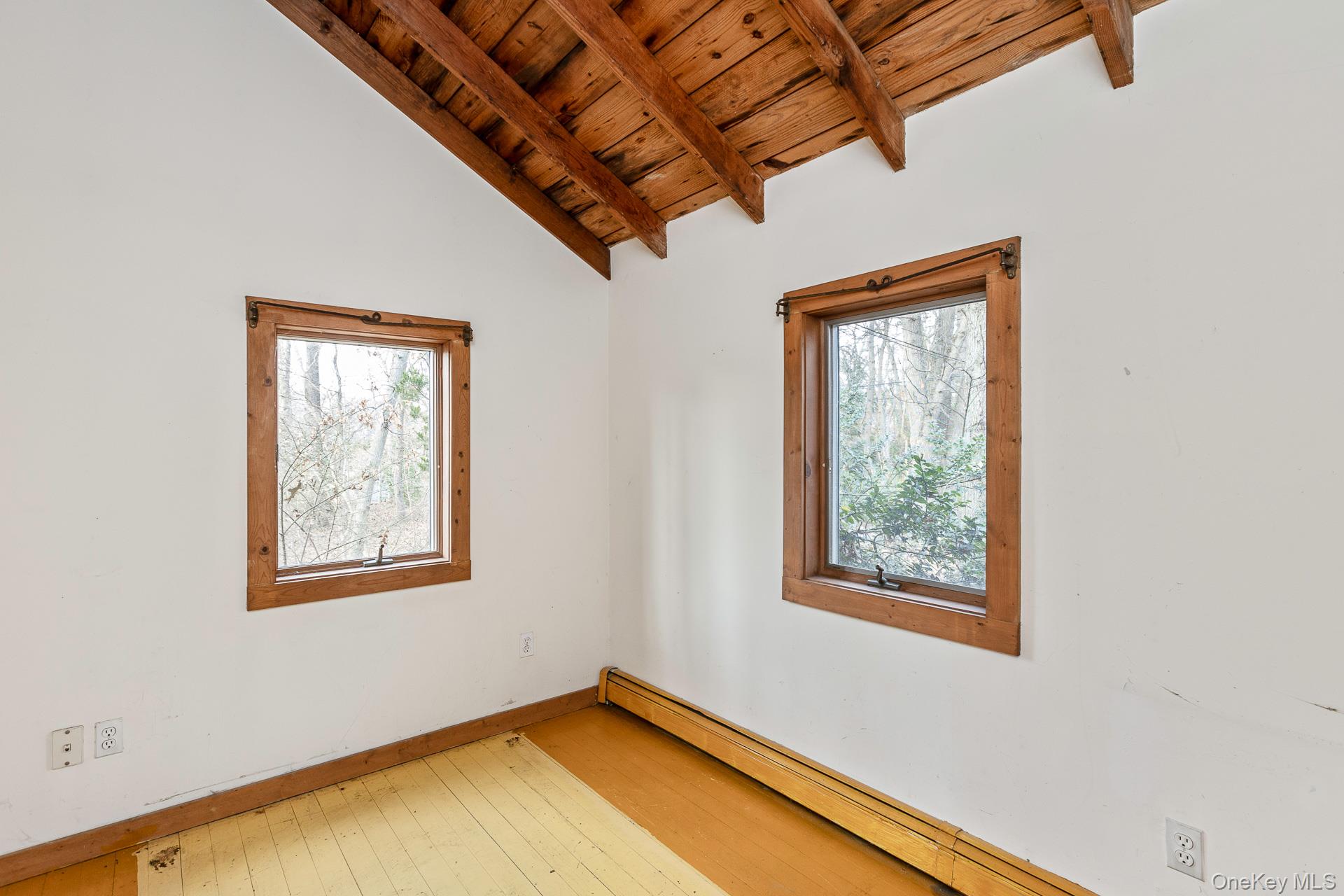 62 Birch Hill Road Mount Sinai, NY 11766 - Photo 11 of 36 a view of a front door with wooden floor