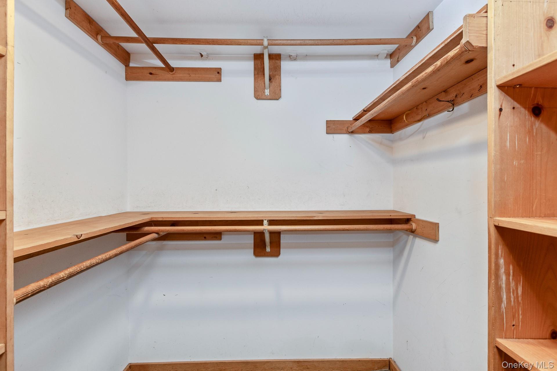 62 Birch Hill Road Mount Sinai, NY 11766 - Photo 13 of 36 a close up of a room with racks on the wall