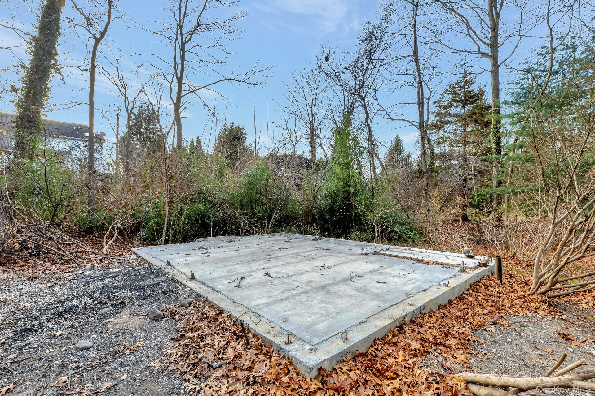 62 Birch Hill Road Mount Sinai, NY 11766 - Photo 17 of 36 a view of a backyard of the house