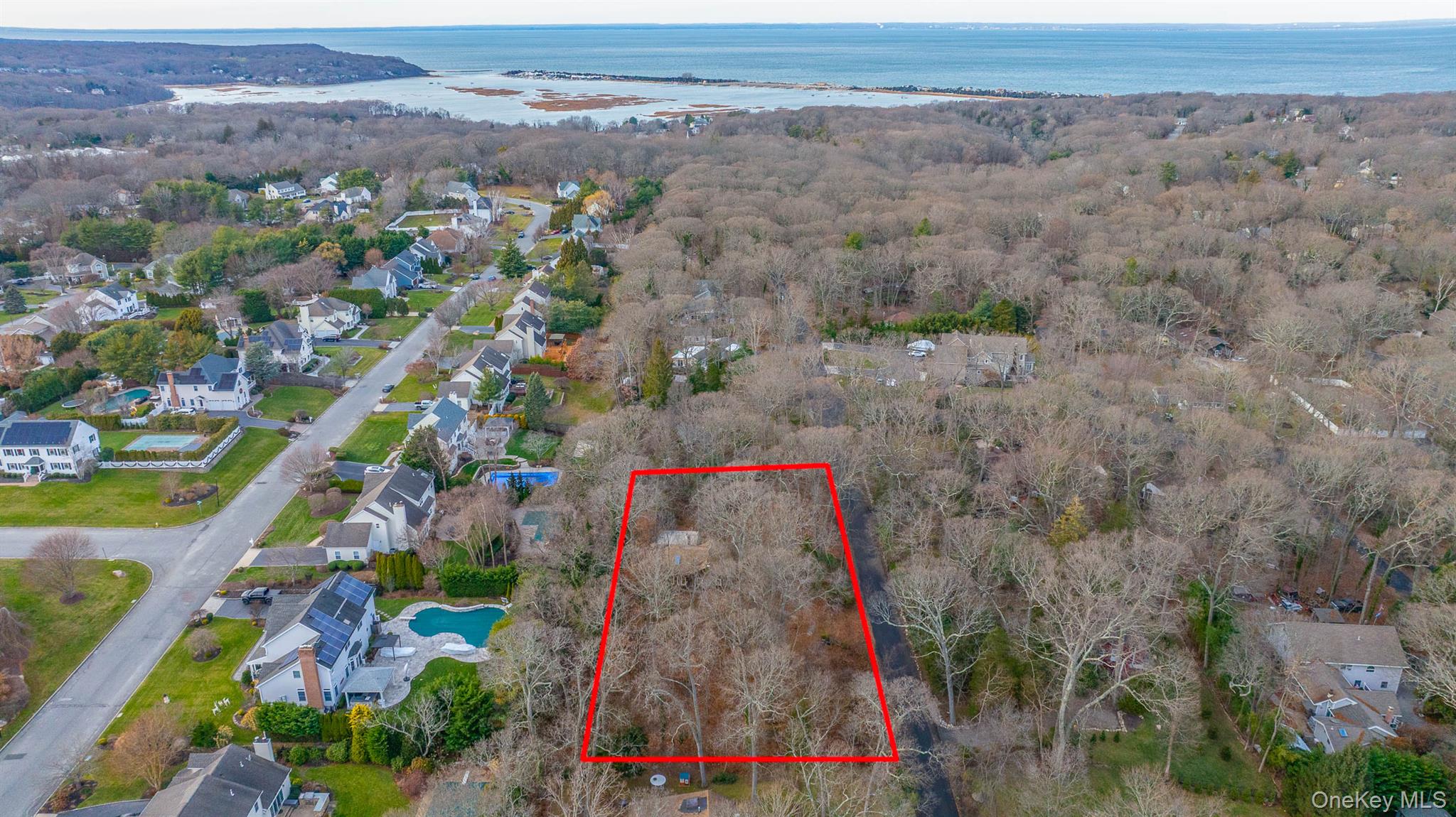 62 Birch Hill Road Mount Sinai, NY 11766 - Photo 31 of 36 an aerial view of a houses with a yard