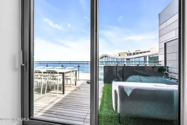 a balcony with an ocean view