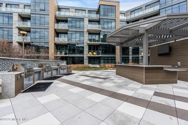 a view of pool with outdoor seating