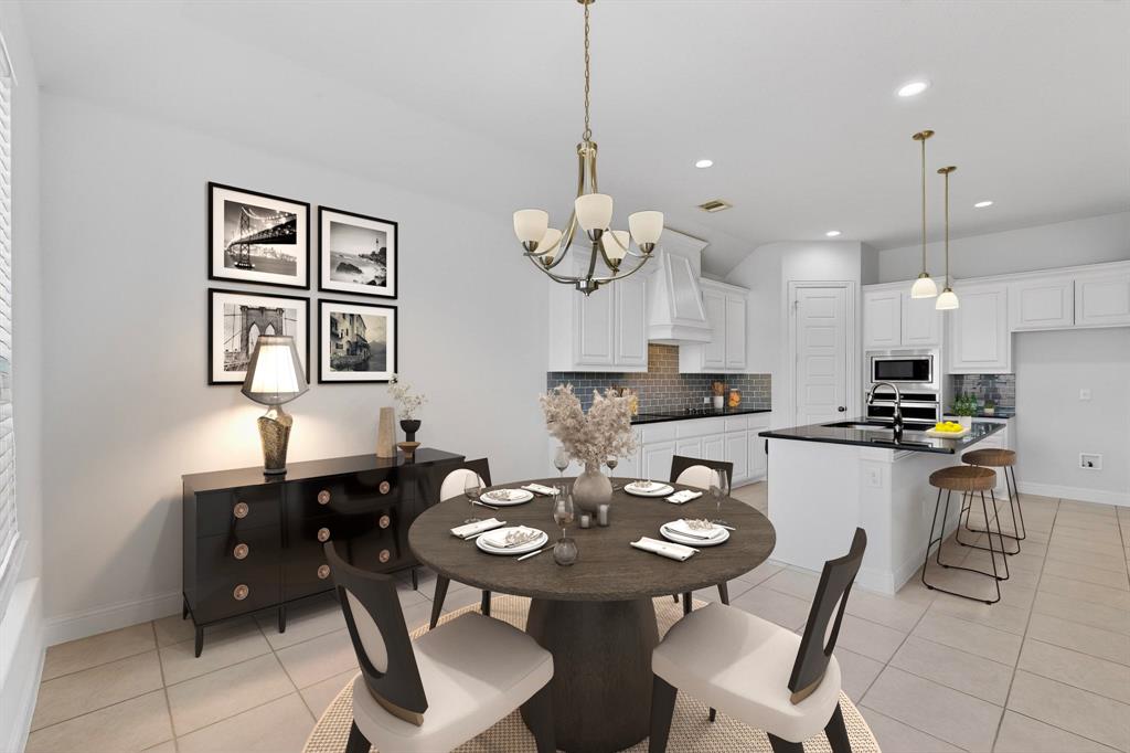 805 Rustic Trail Midlothian, TX 76065 - Photo 12 of 40 a kitchen with a dining table and chairs