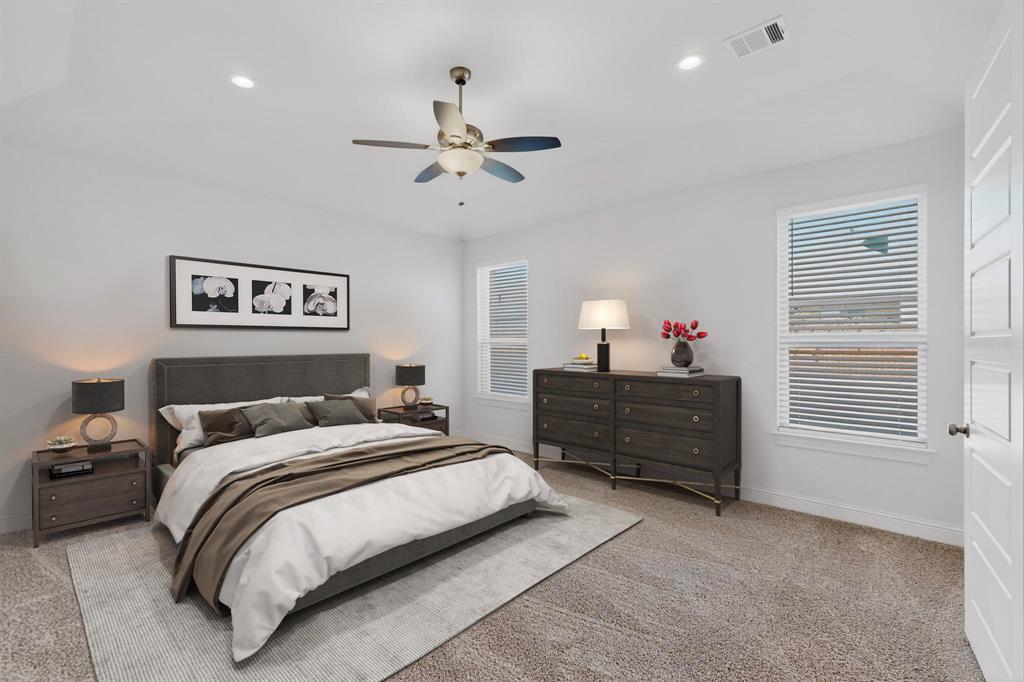 805 Rustic Trail Midlothian, TX 76065 - Photo 17 of 40 a bedroom with a bed and a chandelier