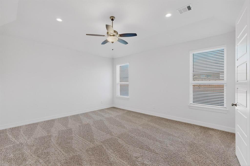 805 Rustic Trail Midlothian, TX 76065 - Photo 18 of 40 a view of an empty room with a window