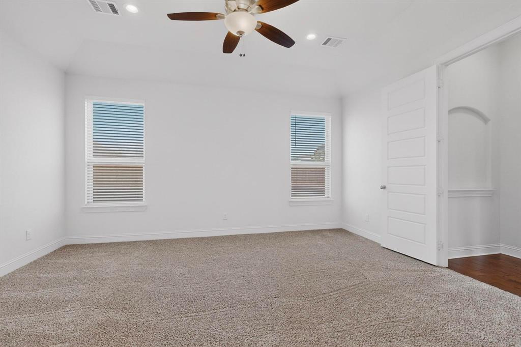 805 Rustic Trail Midlothian, TX 76065 - Photo 19 of 40 a view of an empty room with a window