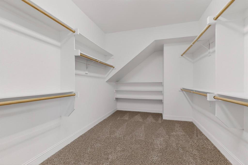 805 Rustic Trail Midlothian, TX 76065 - Photo 25 of 40 a view of an empty walk in closet