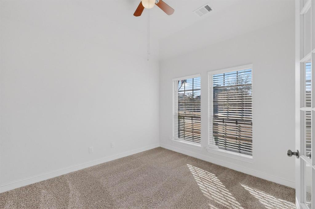 805 Rustic Trail Midlothian, TX 76065 - Photo 26 of 40 a view of an empty room with a window