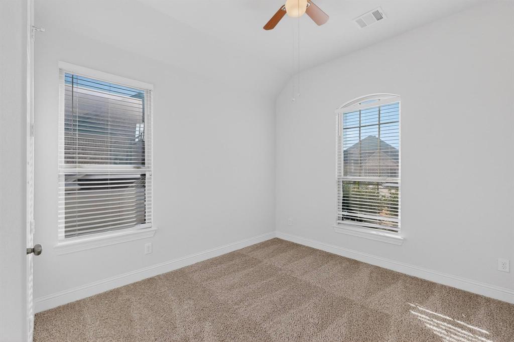 805 Rustic Trail Midlothian, TX 76065 - Photo 30 of 40 a view of an empty room with a window