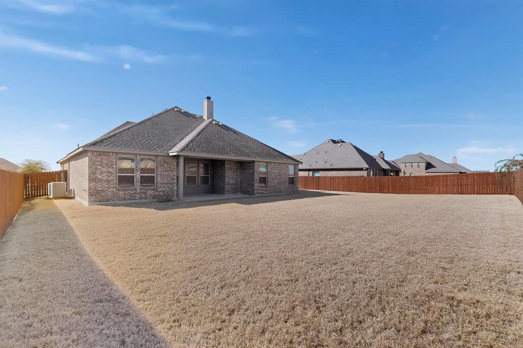 805 Rustic Trail Midlothian, TX 76065 - Photo 39 of 40 a house with a yard