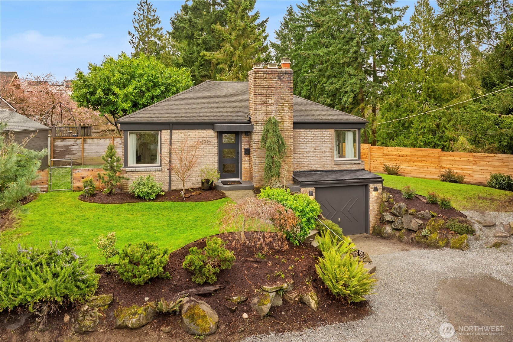 3911 Southwest Forest Street Seattle, WA 98116 - Photo 2 of 40 front view of house with a yard