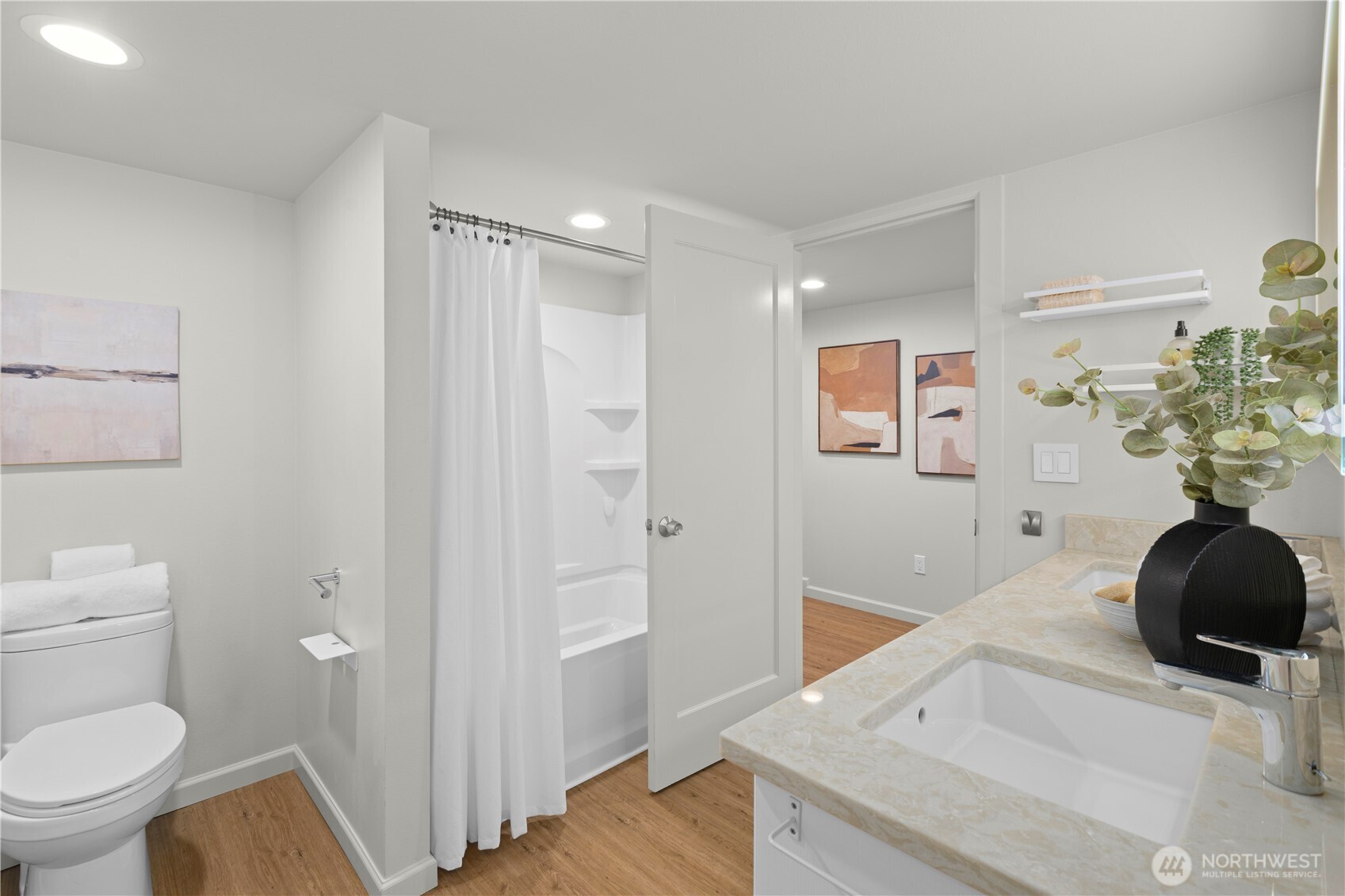 3911 Southwest Forest Street Seattle, WA 98116 - Photo 25 of 40 a bathroom with a sink a toilet and a mirror