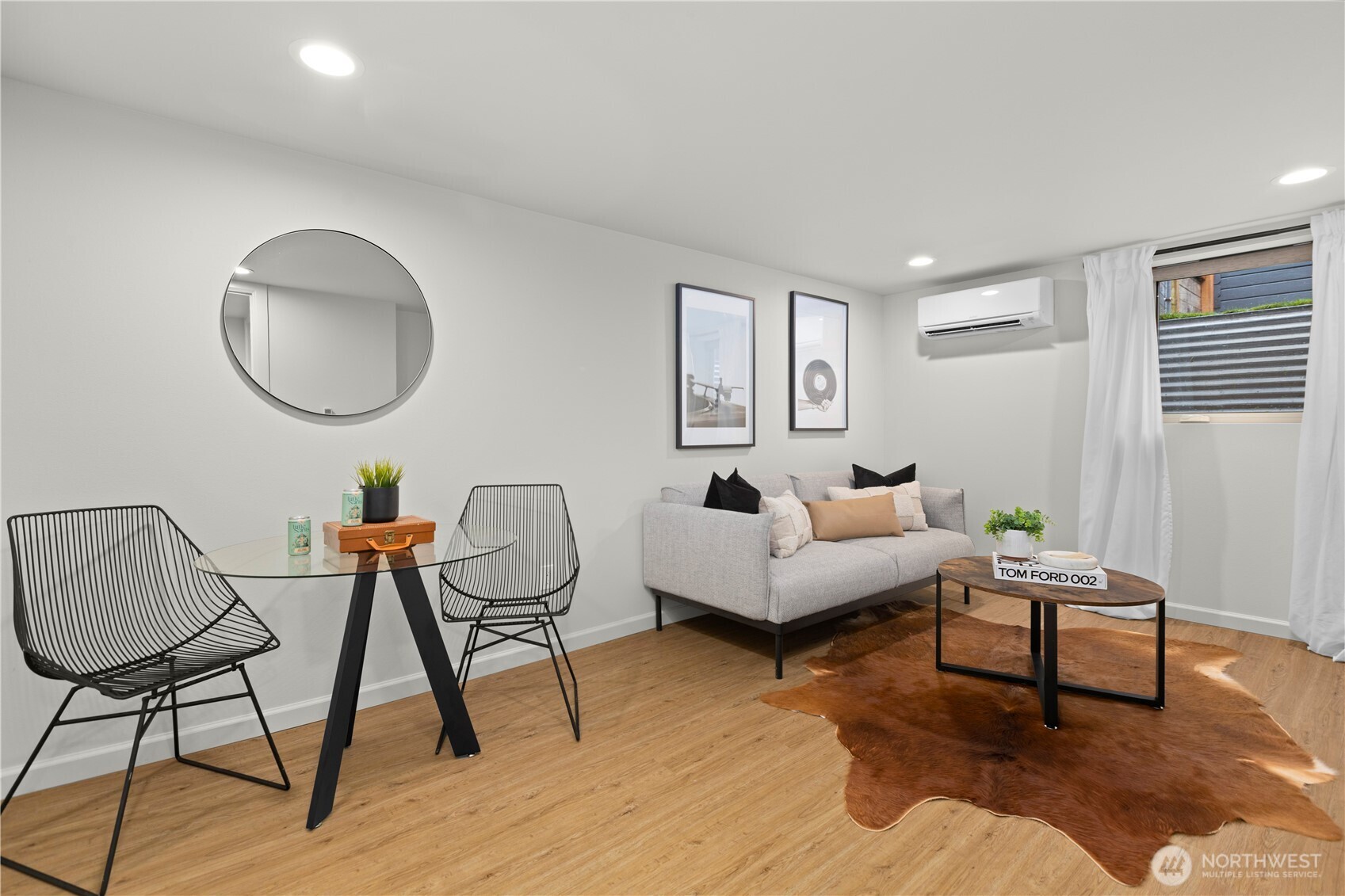 3911 Southwest Forest Street Seattle, WA 98116 - Photo 26 of 40 a living room with furniture and a potted plant