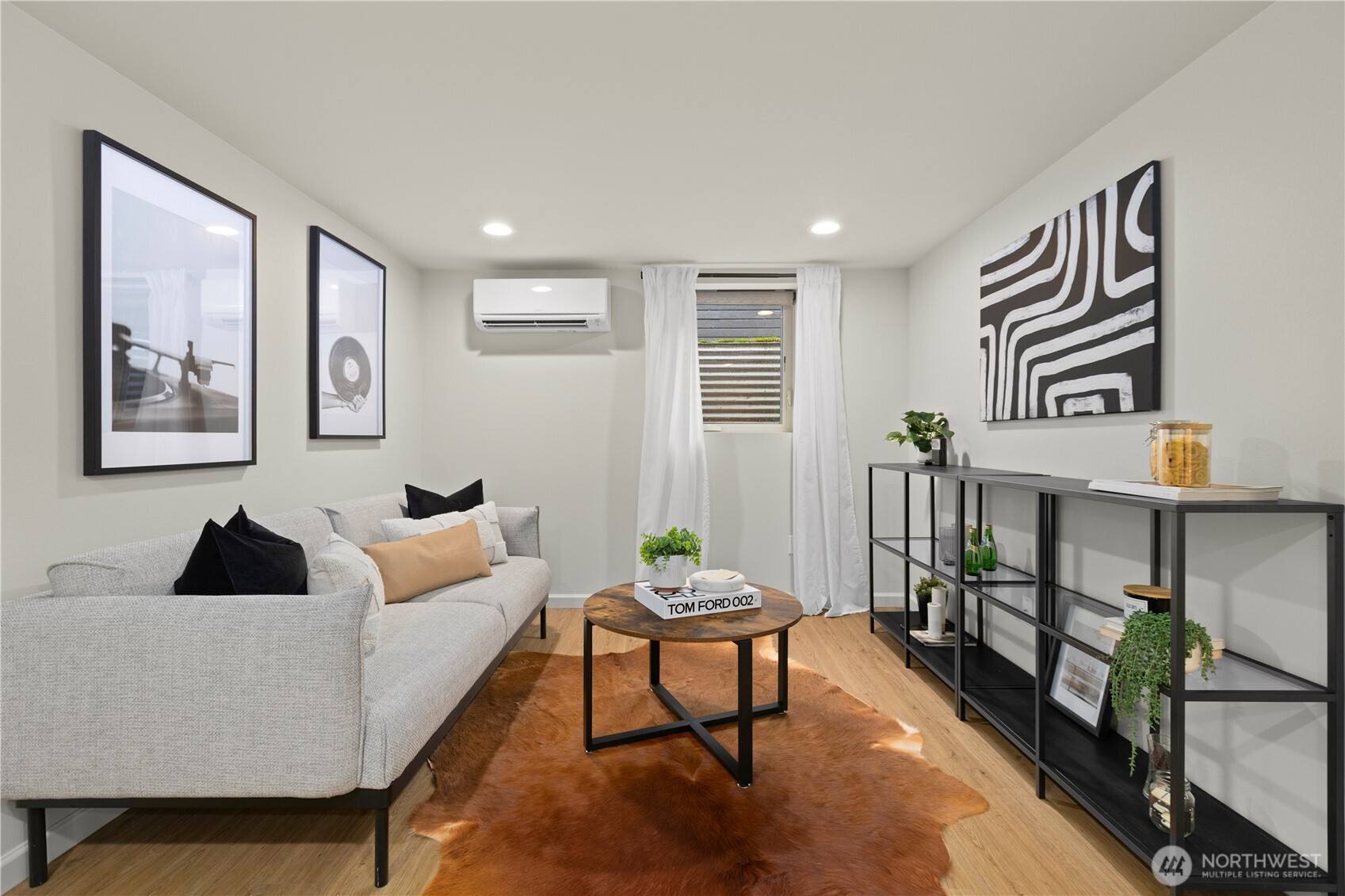 3911 Southwest Forest Street Seattle, WA 98116 - Photo 28 of 40 a living room with furniture and a window