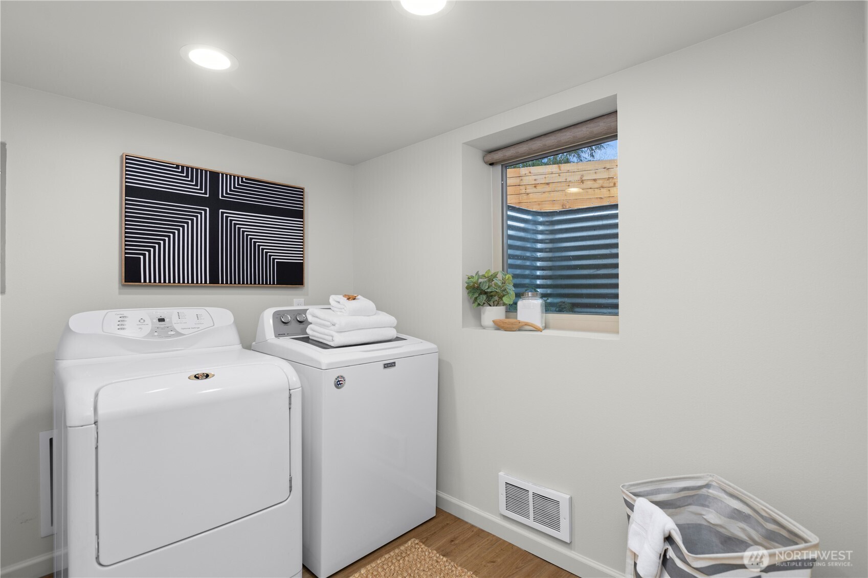 3911 Southwest Forest Street Seattle, WA 98116 - Photo 30 of 40 a utility room with dryer and washer