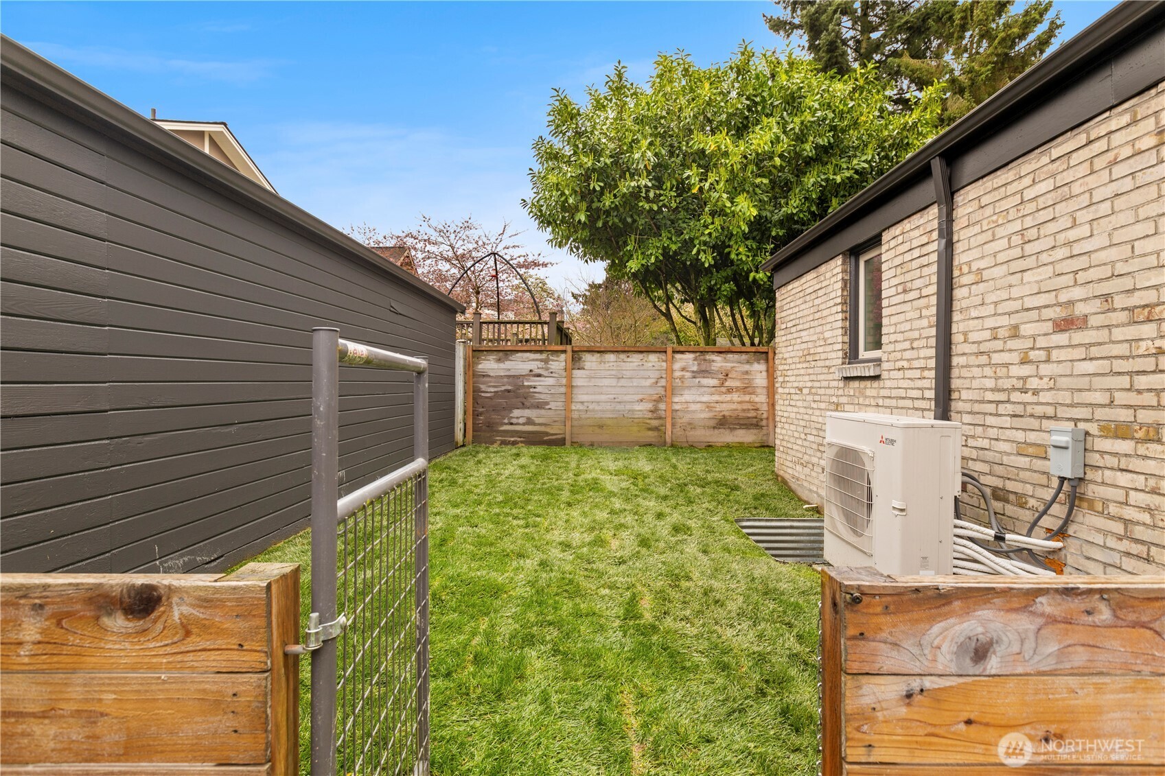 3911 Southwest Forest Street Seattle, WA 98116 - Photo 36 of 40 a view of a back yard of the house