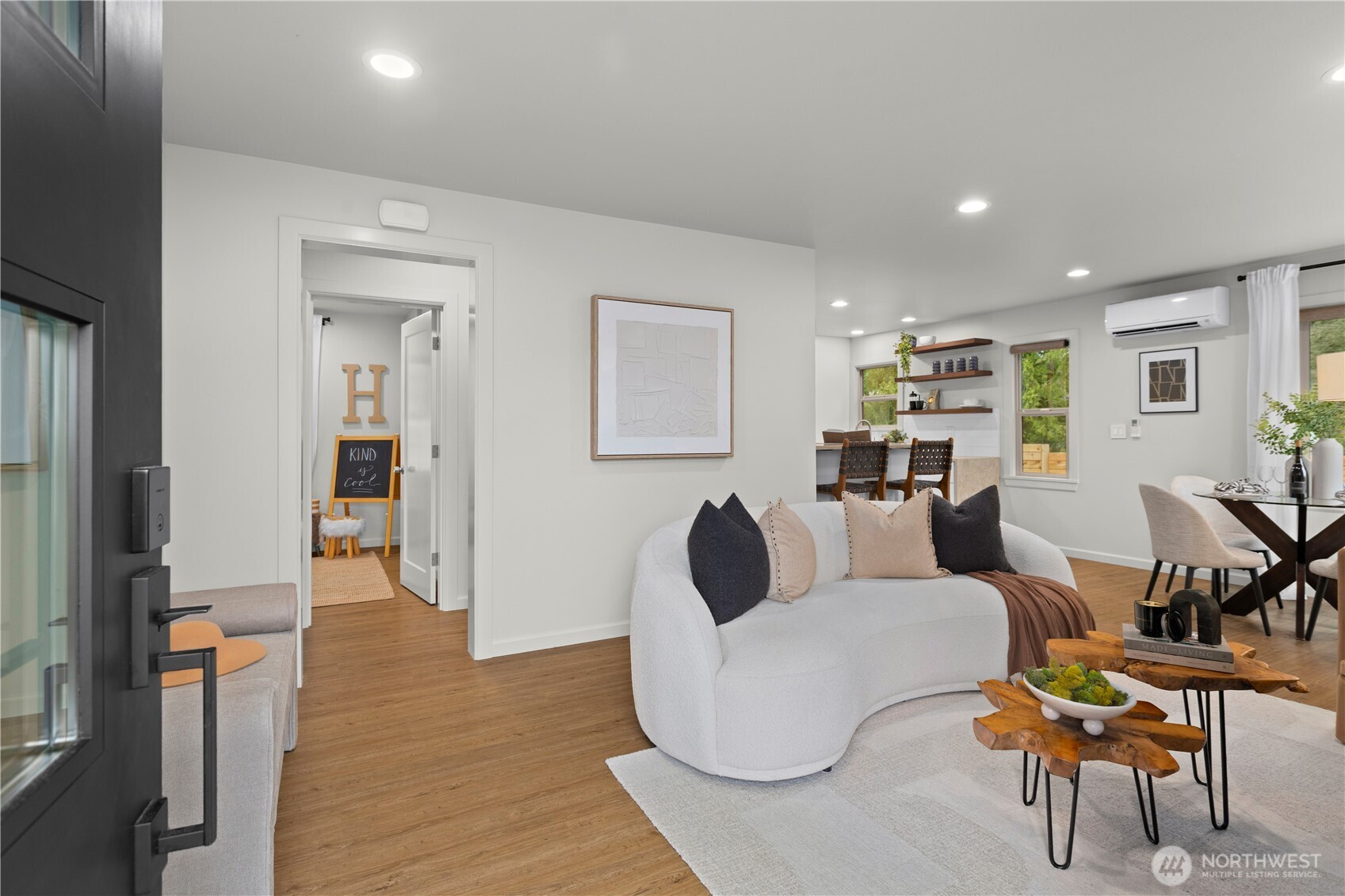 3911 Southwest Forest Street Seattle, WA 98116 - Photo 5 of 40 a living room with furniture and wooden floor