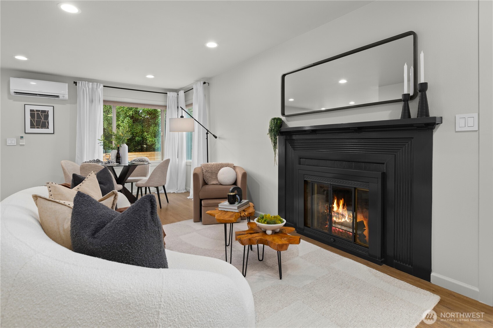 3911 Southwest Forest Street Seattle, WA 98116 - Photo 7 of 40 a living room with furniture and a fireplace