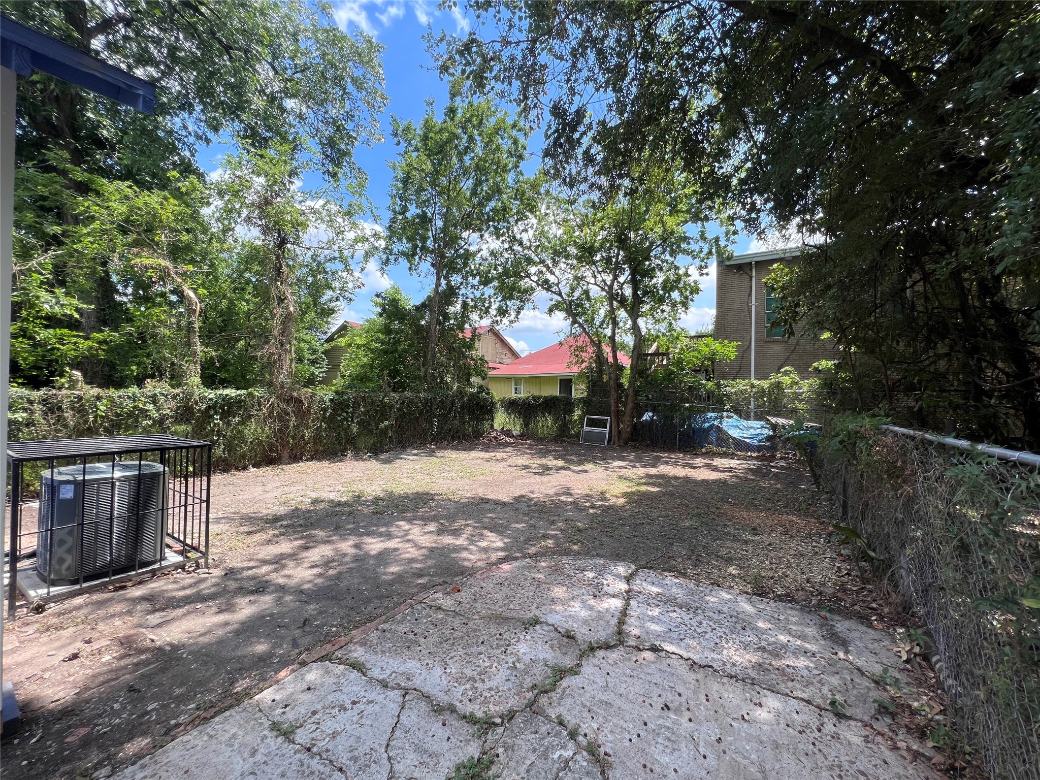 2412 Stuart Street Houston, TX 77004 - Photo 20 of 32 a backyard of a house with barbeque oven and outdoor seating