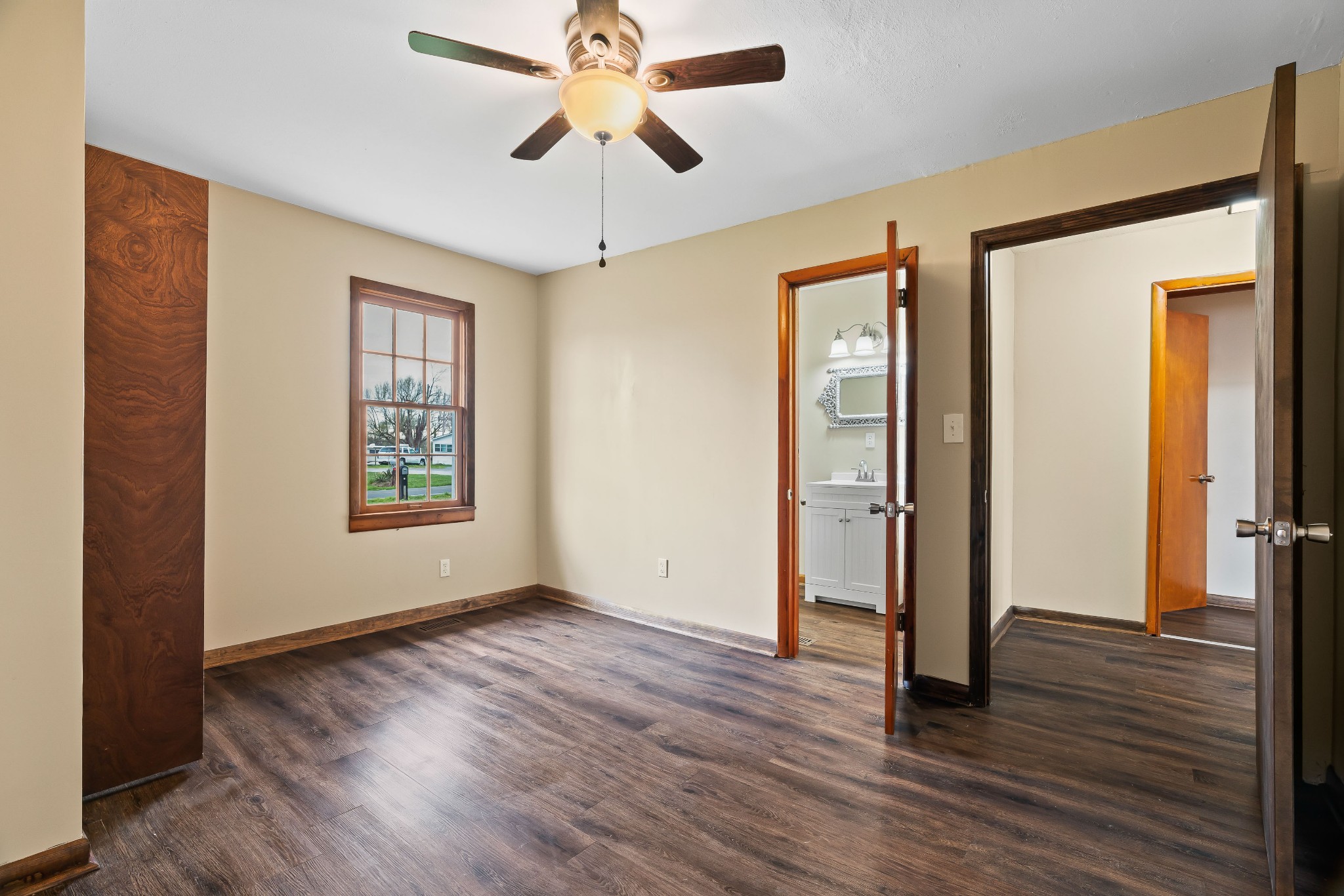 903 Days Road Lafayette, TN 37083 - Photo 17 of 38 wooden floor in an empty room with a window