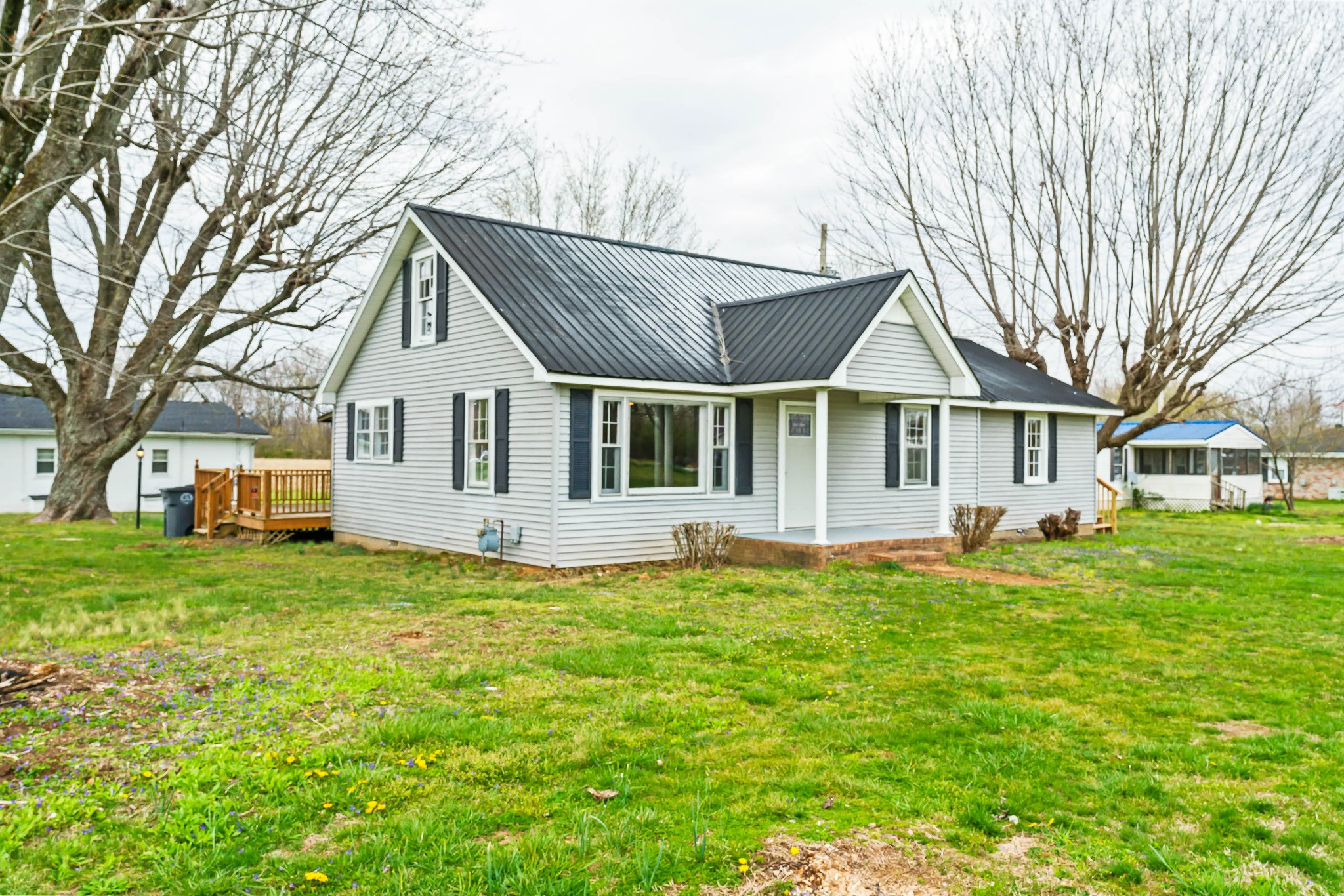 903 Days Road Lafayette, TN 37083 - Photo 30 of 38 a view of a house with a yard