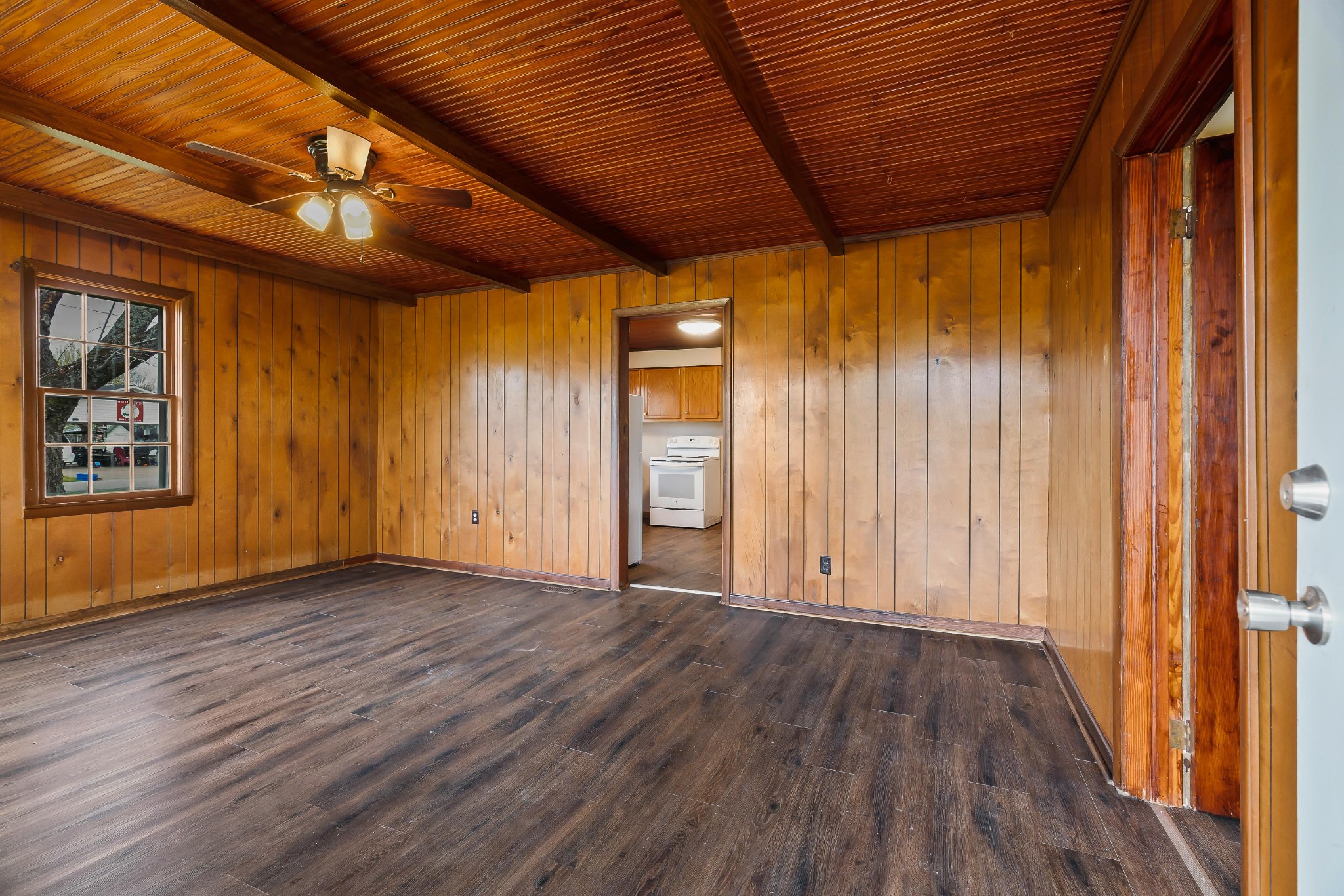 903 Days Road Lafayette, TN 37083 - Photo 3 of 38 an empty room with wooden floor and windows