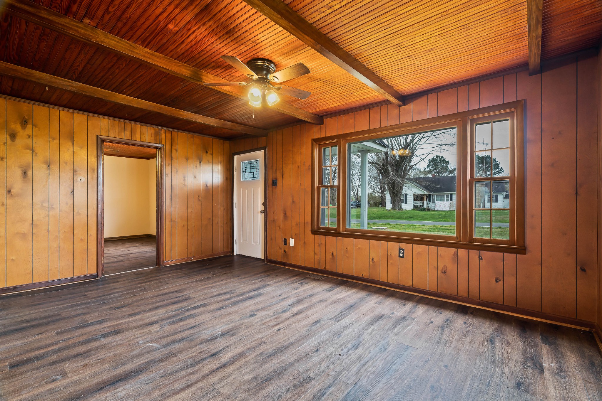 903 Days Road Lafayette, TN 37083 - Photo 5 of 38 an empty room with wooden floor and windows