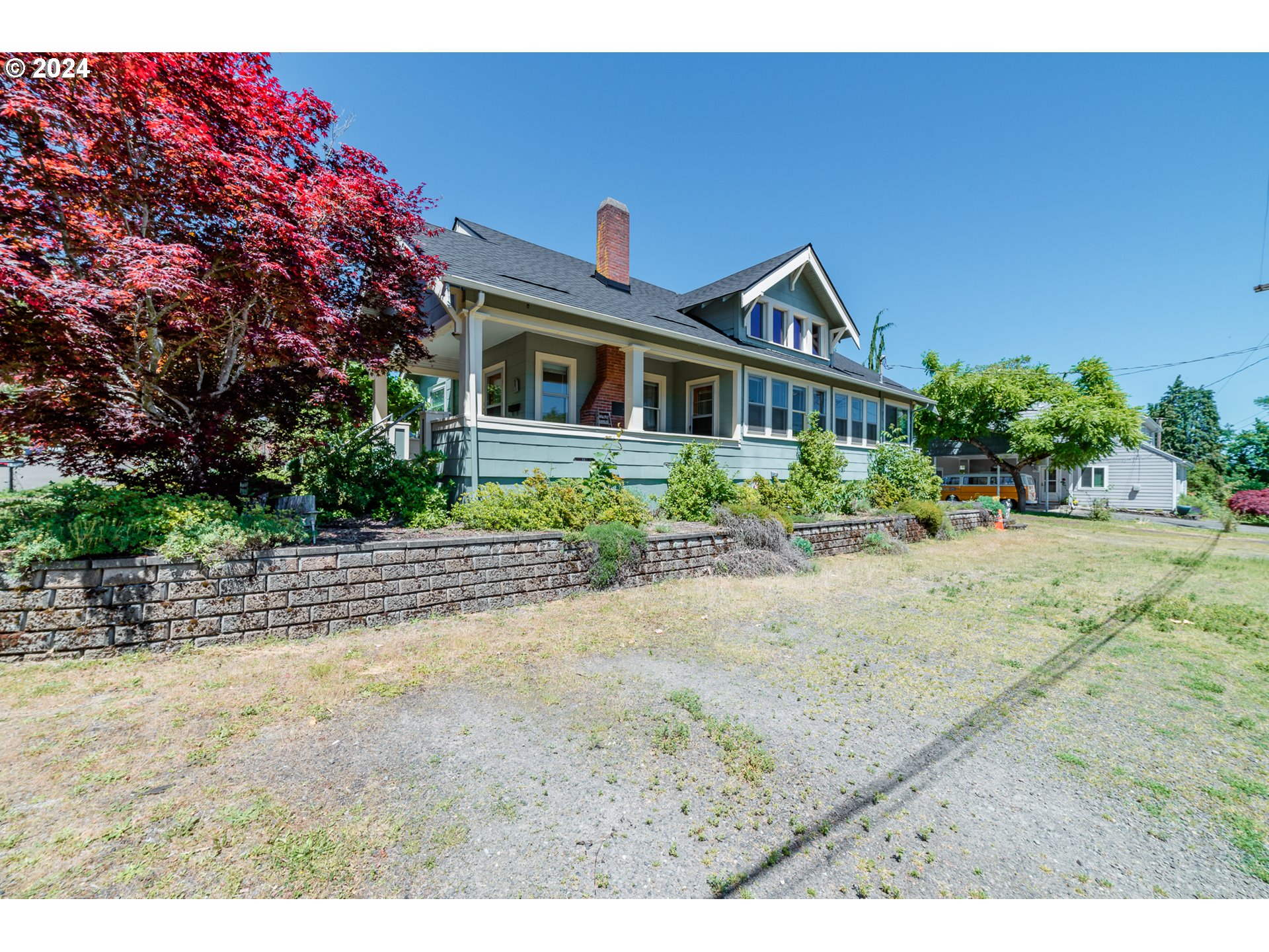 1306 Northeast Birch Street Camas, WA 98607 - Photo 1 of 23 a front view of a house with a yard