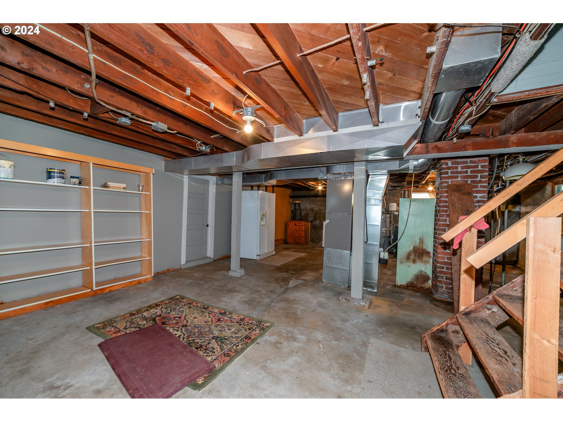 1306 Northeast Birch Street Camas, WA 98607 - Photo 18 of 23 a view of an empty room with a staircase