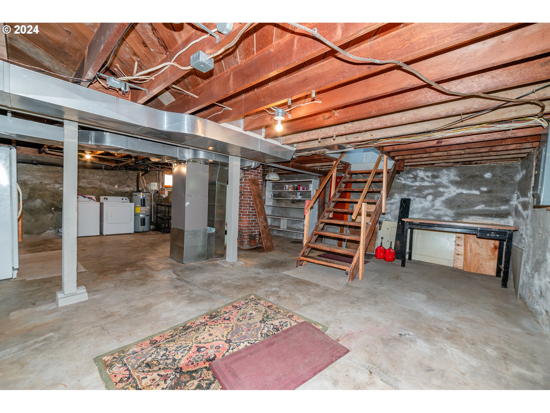 1306 Northeast Birch Street Camas, WA 98607 - Photo 19 of 23 a view of an empty room with wooden floor