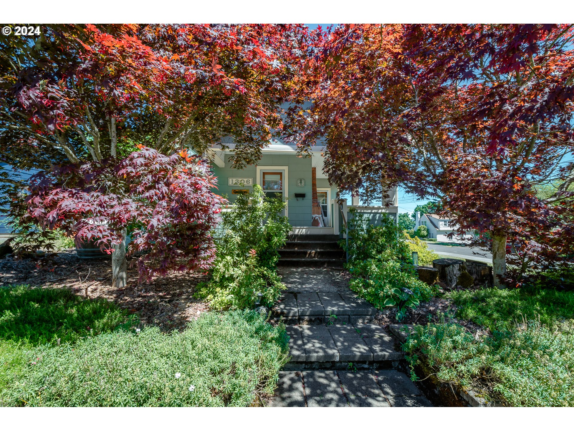 1306 Northeast Birch Street Camas, WA 98607 - Photo 2 of 23 a front view of a house with a yard
