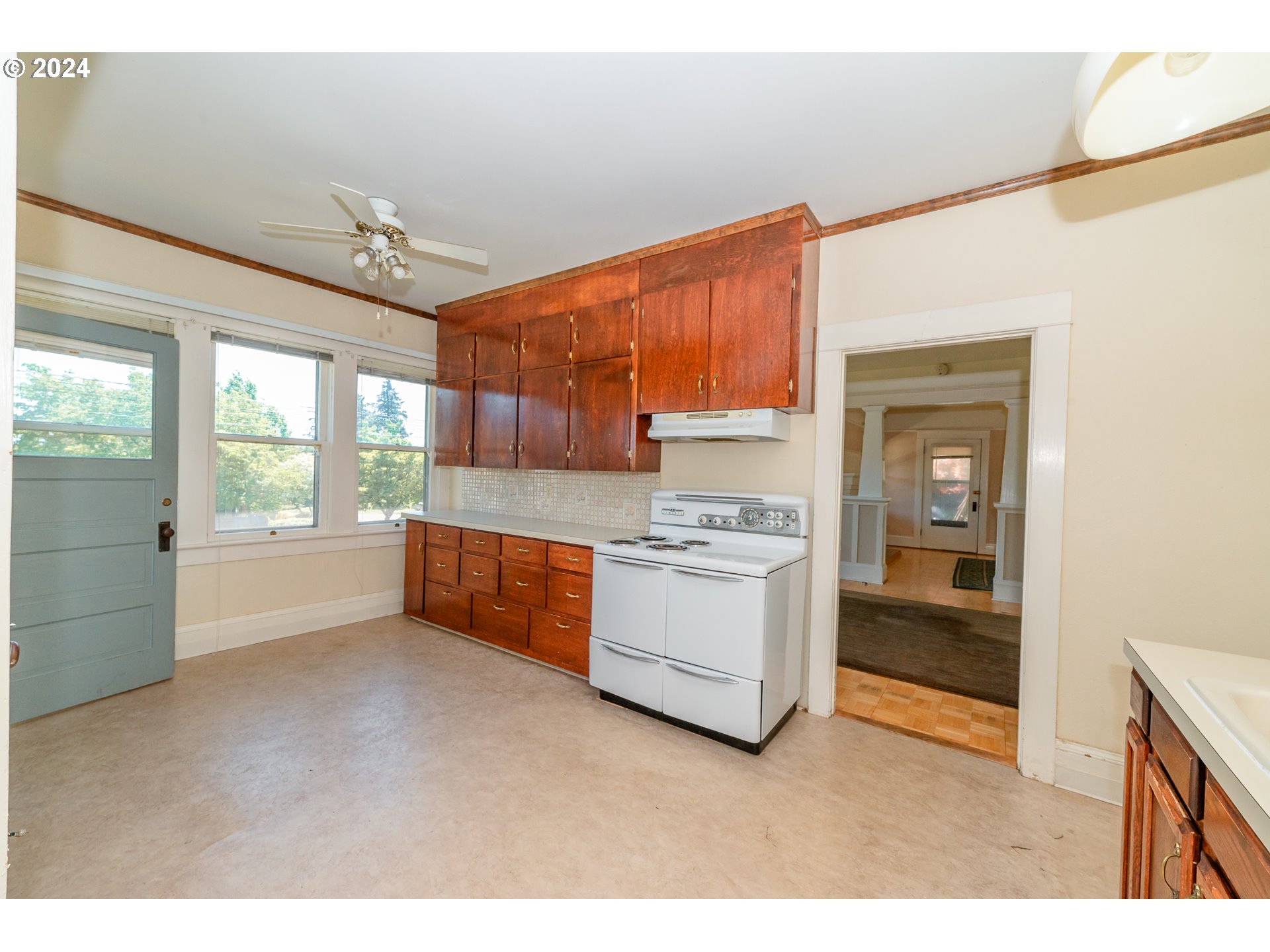 1306 Northeast Birch Street Camas, WA 98607 - Photo 9 of 23 a kitchen with a window a sink and a counter top space
